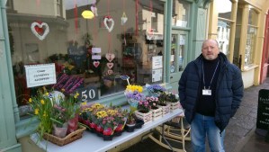 Councillor Alan Jones outside Flowers by Stacey